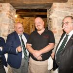 I Simposiarchi con il proprietario e il Delegato